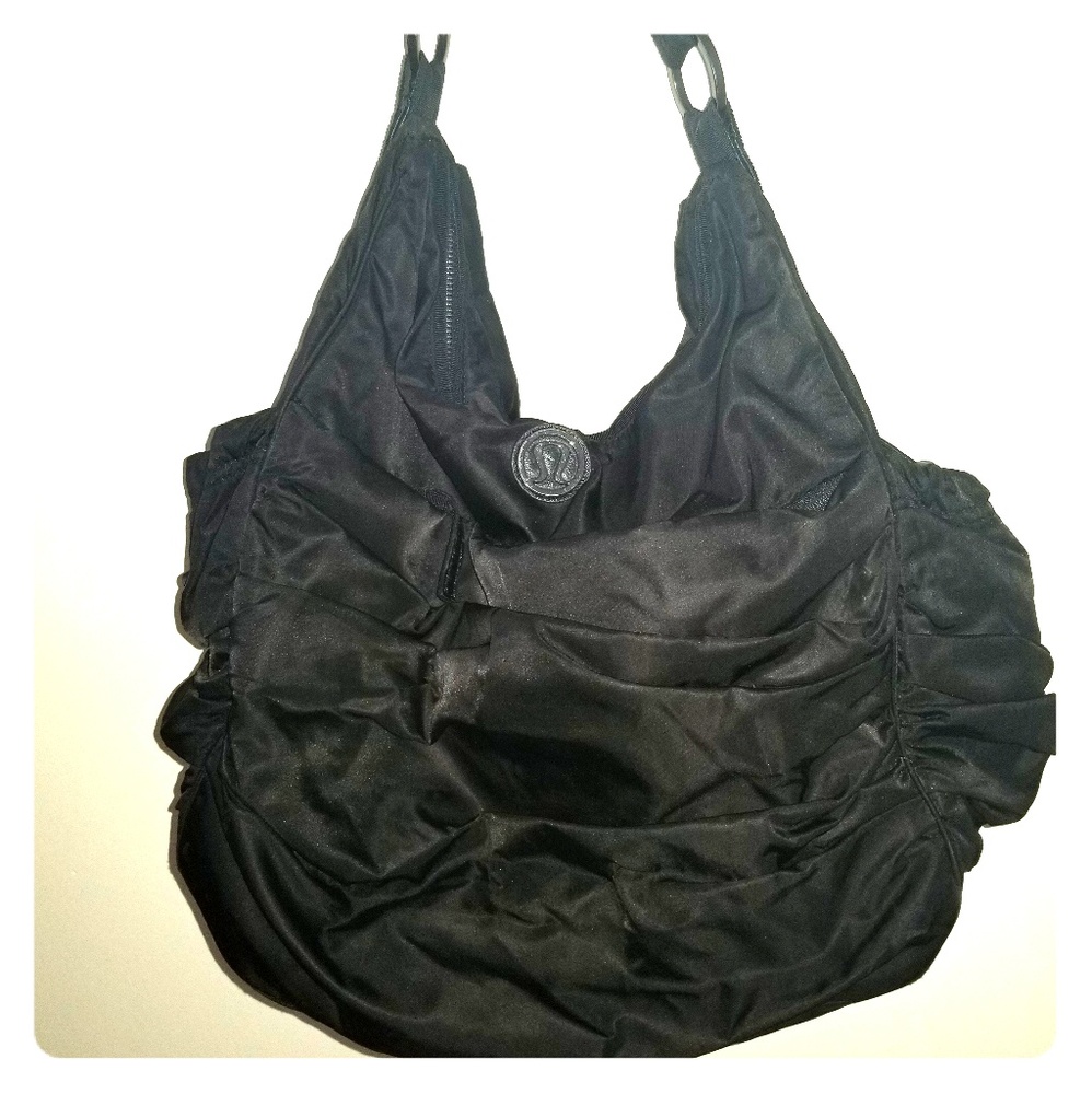 Black Lululemon over-the-shoulder gym bag